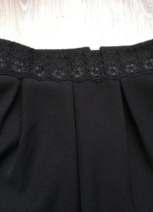 Красивая чёрная коротенькая юбка3 фото
