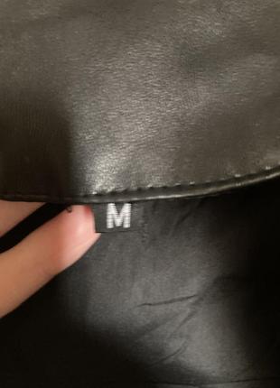 Чоловічий шкіряний пуховик