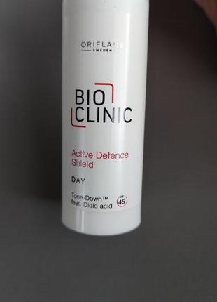 Крем выравнивающий тон кожи дневной орифлейм oriflame bio clinic spf 45 day2 фото