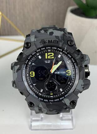 Чоловічий спортивний годинник skmei 1155 електронне з підсвічуванням світла, камуфляжний годинник з будильником камуфляж серый2 фото