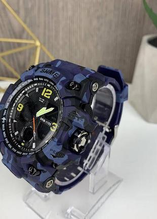 Мужские спортивные часы skmei 1155 электронные с подсветкой света, камуфляжные часы с будильником камуфляж синый3 фото