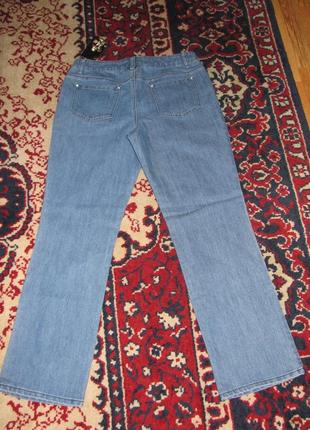 Красивые, новые, плотные, прямые джинсы с вышивкой. р-р 48-52.3 фото