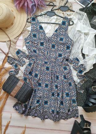 Легкое летнее платье клеш с узорами и поясом в бохо стиле9 фото