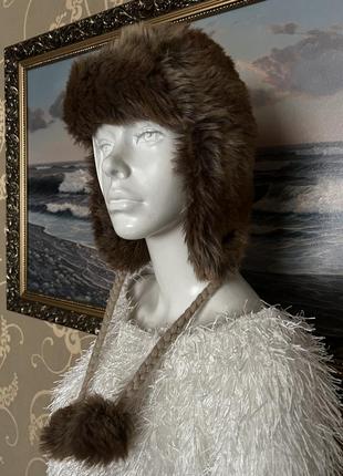 Очень красивая и стильная брендовая меховая шапка.9 фото