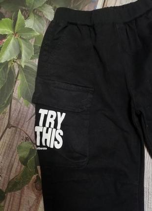 Коттоновые брюки - джоггеры, на резинке, с накладными карманами5 фото