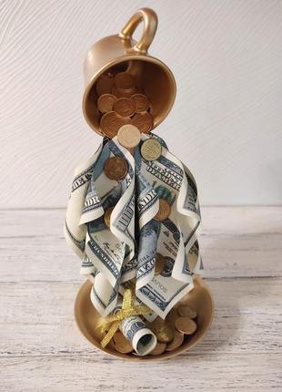 Сувенір статуетка левітуюча чашка з золотим напиленням та доларами ручна робота хендмейд подарунок1 фото