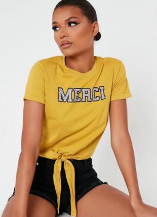 A. m. london. товар куплен в англии. мустардовая футболка с принтом.