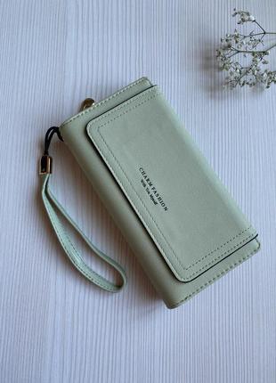 Жіночий гаманець-портмоне розкладний з екошкіри оливкового кольору з ремінцем на зап'ястку