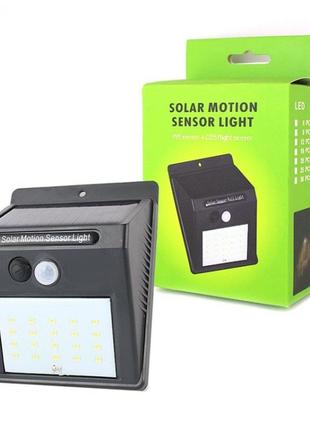 Настінний вуличний світильник solar motion sensor light 16051 фото