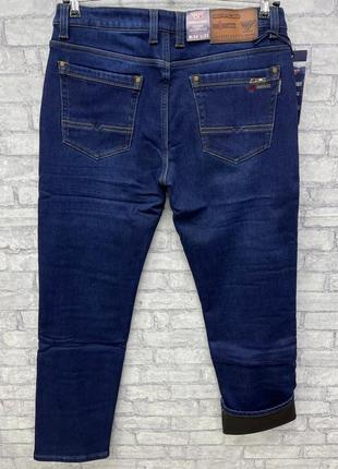 Чоловічі сині утеплені зимові прямі джинси на флісі великих розмірів батал2 фото
