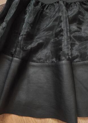 Короткая свободная расклешенная юбка с высокой эластичной талией6 фото