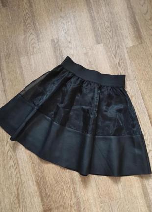 Короткая свободная расклешенная юбка с высокой эластичной талией5 фото