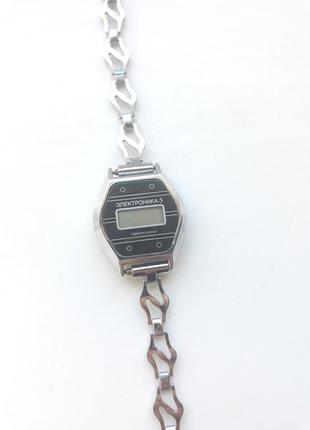 Женские аналоговые стальные часы электроника2 фото
