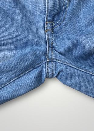 Рваные джинсы5 фото