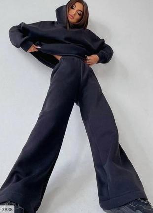 Теплий костюм з розкльошеними штанами4 фото