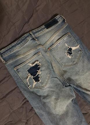 Рванные джинсы на высокой талии4 фото