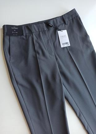 Классические качественные серые брюки зауженные к низу6 фото