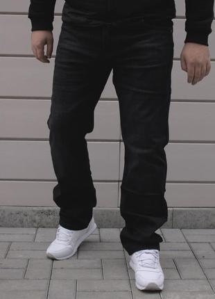 Чоловічі джинси на мікрофлісі , прямі,  чорні4 фото