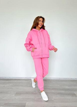 Теплий жіночий костюм з рожевого трикотажу на флісі толстовка штани рожевий