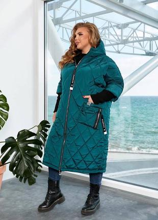 Зимове жіноче пальто з капюшоном великого розміру7 фото