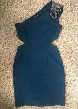 Сукня з вирізами