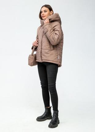 Зимова жіноча куртка з капюшоном та сумкою в комплекті.  розміри 44 46 48 502 фото