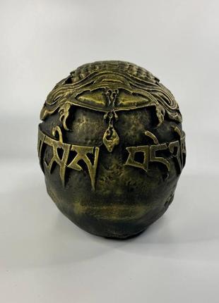 Тибетський череп золотий3 фото