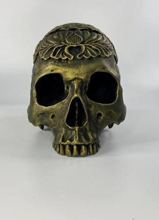Тибетський череп золотий2 фото