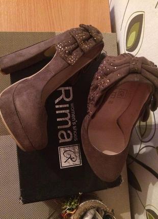 Жіноче взуття rima5 фото