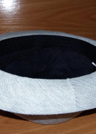 Чудовий сірий капелюх зі стрічкою бантиком сріблястим2 фото