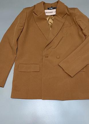 Піджак коричневого кольору, сток