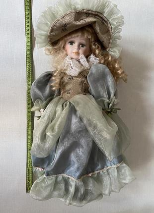 Фарфорова лялька кукла