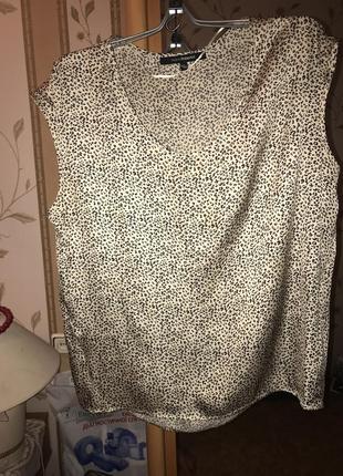 Блузка спереди короче