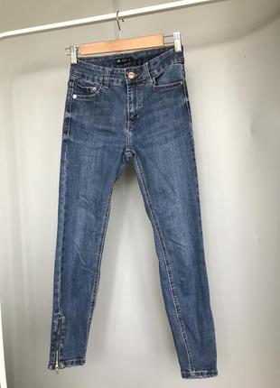Жіночі джинси з розрізом1 фото