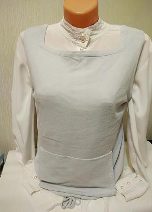 Жіноча жилетка