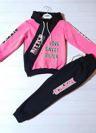 Спортивный костюм теплый на девочек темно-розовый с черным.