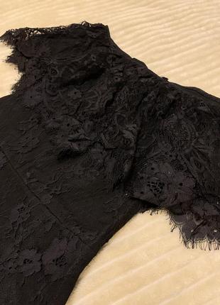 Мереживна чорна сукня довжини міді8 фото