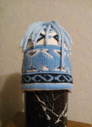 Шапочка з пензликами