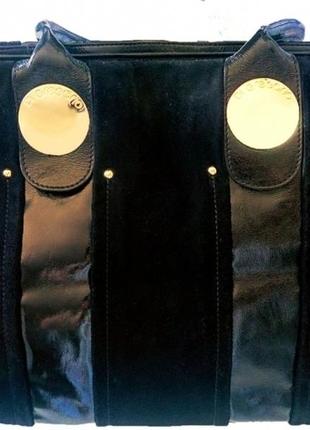 Фирменная итальянская кожаная сумка.1 фото