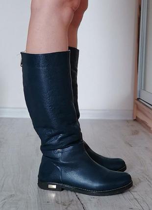 Високі фірмові з натуральної шкіри, зимові - дуже теплі на хутрі жіночі чоботи.