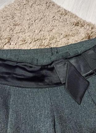 Класичні сірі брюки з атласним бантом3 фото