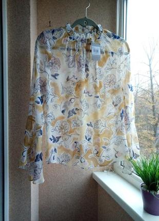 Красивейшая полупрозрачная блуза с оригинальным длинным рукавом3 фото
