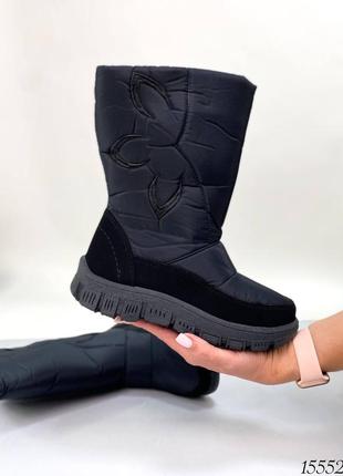 Чорні зимові високі дутіки чоботи на товстій грубій підошві зима10 фото