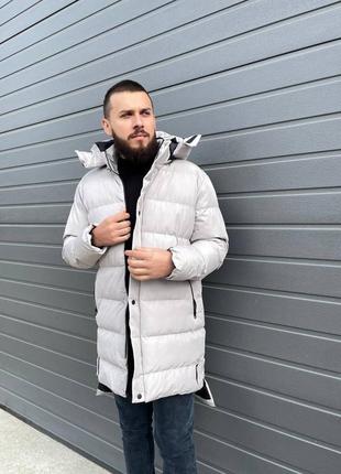 Зимова довга світла куртка