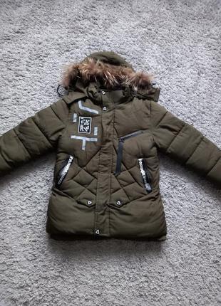Продається зимова  курточка для хлопчика,на ріс 140-146см.