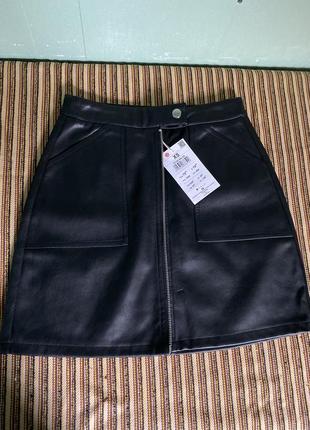 Нова шкіряна спідниця