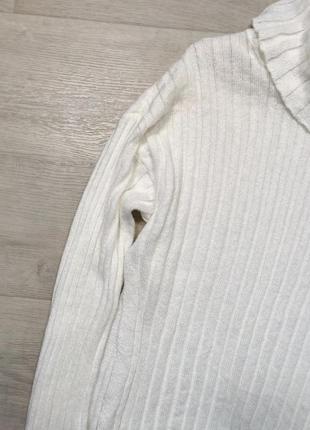 Білий светр з розрізами2 фото
