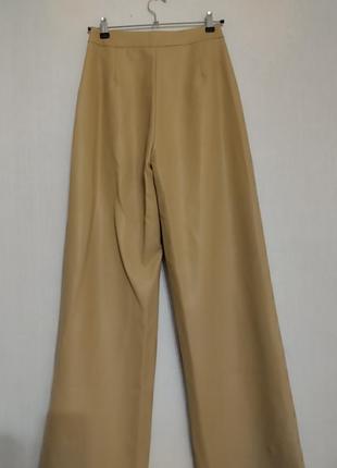 Шикарные люксовые брюки палаццо из эко кожи4 фото