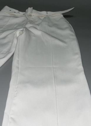 Брюки білого кольору, сток