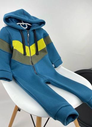 Синій трикотажний комбінезон на флісі з капюшоном модель полоски